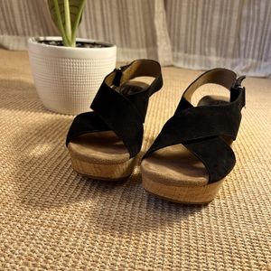 Black, suede Clark’s artisan sandles
